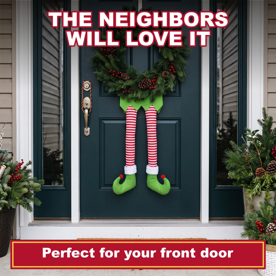 Striped elf legs under a front door wreath