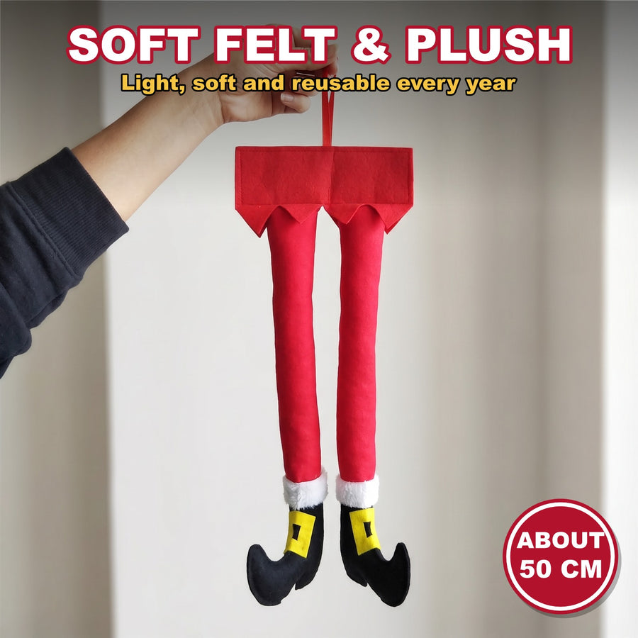 Santa legs held by hand to show the size