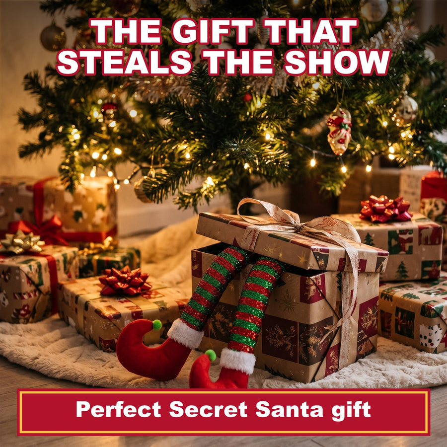 Glitter elf legs sticking out of a gift box